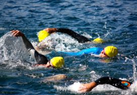 Fallen SEALs honored in swim around Coronado Island